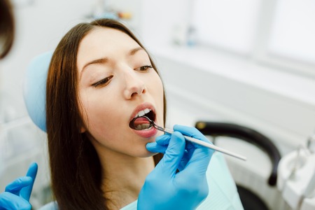 dentist and the patient in the clinic.の写真素材