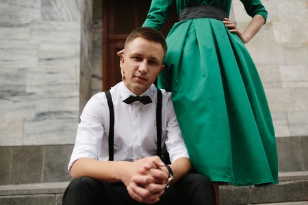 European beautiful couple posing on the streetの写真素材