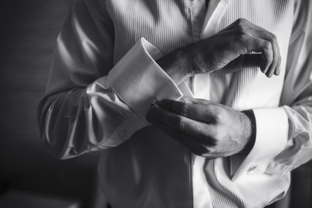 Groom preparing for the morning of the wedding ceremony