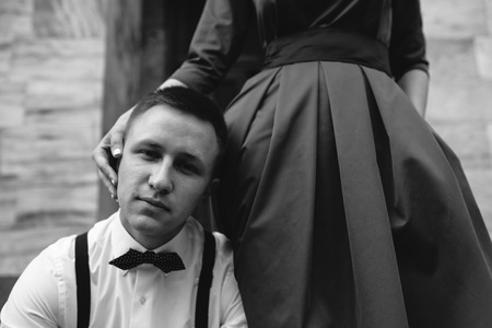 European beautiful couple posing on the streetの写真素材