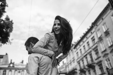 beautiful couple having fun and walking at the big cityの写真素材