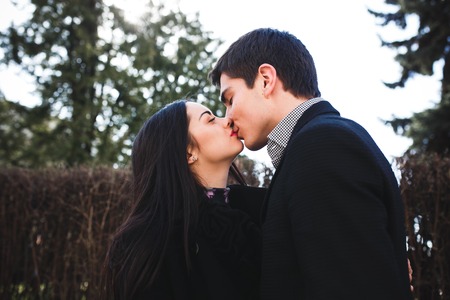 beautiful girl and her boyfriend met in the parkの写真素材