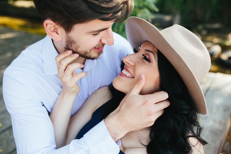 man and woman at the lake to spend time in each other's armsの写真素材