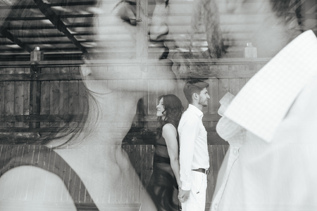 double photo beautiful young couple on vacation in the parkの写真素材