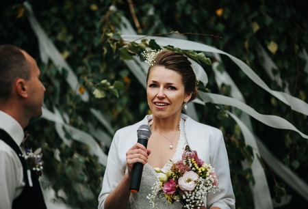 beautiful bride speak at the wedding ceremonyの写真素材