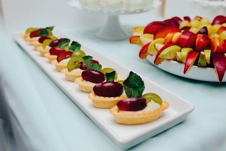 beautiful wedding composition with fruits and pastryの写真素材