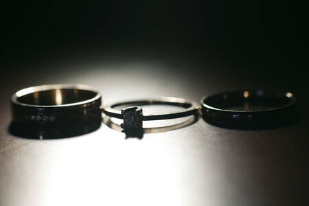 Three nice wedding rings. Love concept background.の写真素材