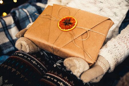 Girl opens a wonderful vintage giftの写真素材