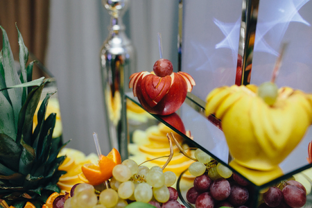 buffet with tropical fruit on the wedding banquetの写真素材