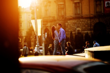 man and woman posing and have fun in the old townの写真素材
