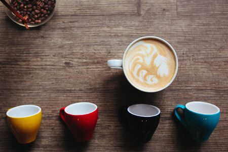 Photo of art composition - lattes on the tableの写真素材