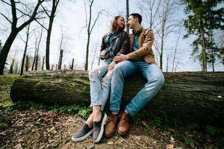 Beautiful young couple relaxing in the parkの写真素材