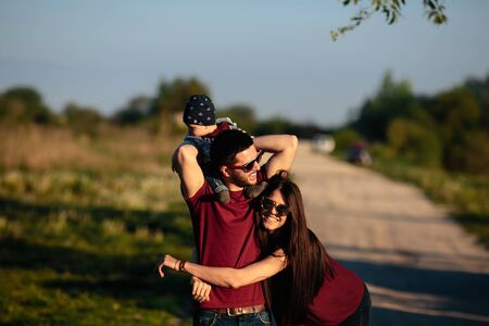 young family have fun and relaxing outdoors in the countryside