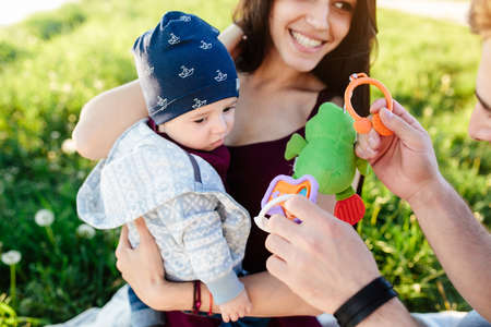 young family have fun and relaxing outdoors in the countrysideの写真素材