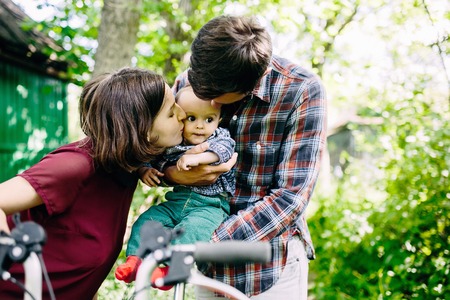 young family have fun and relaxing outdoors in the countrysideの写真素材