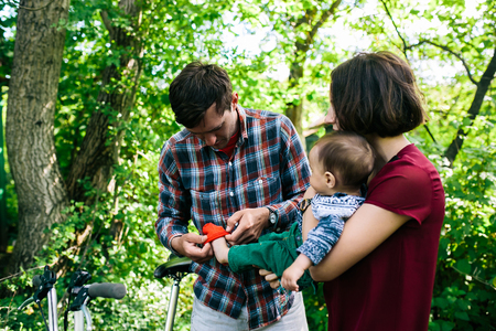 young family have fun and relaxing outdoors in the countryside