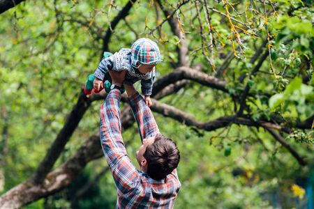 young family have fun and relaxing outdoors in the countrysideの写真素材