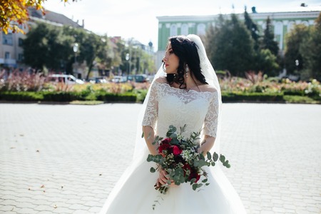 young beautiful bride poses for the cameraの写真素材