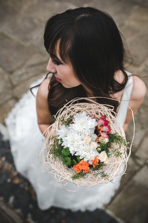 young beautiful bride poses for the cameraの写真素材