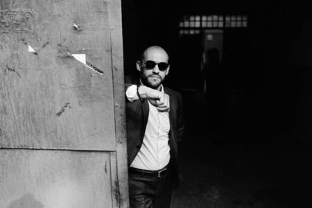 man in the doorway an abandoned buildingの写真素材