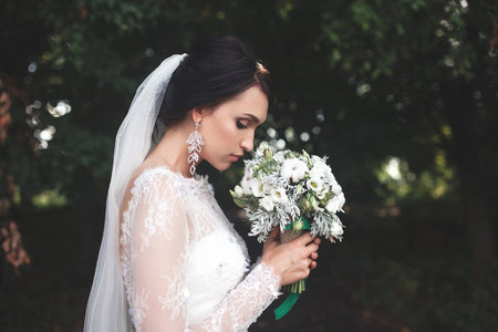 young beautiful bride poses for the cameraの写真素材