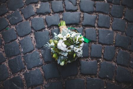 wedding bouquet on the paving stones, close angleの写真素材