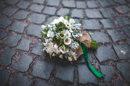 wedding bouquet on the paving stones, close angleの写真素材