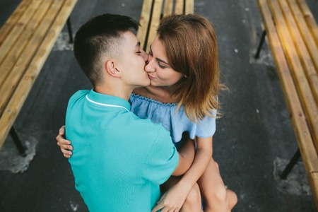 man and woman in a park posing on cameraの写真素材