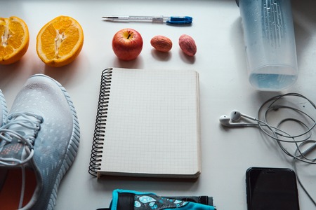 workout and fitnessplanning control diet concept on a white backgroundの写真素材