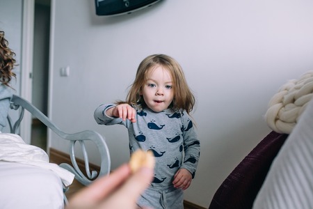 little girl in the bedroomの写真素材