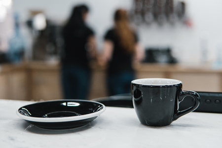 cup of coffee is on the tableの写真素材