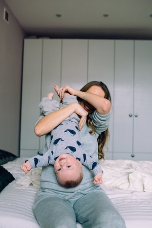 Mother and baby daughter togetherの写真素材