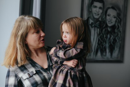 Grandmother with her cute granddaughterの写真素材