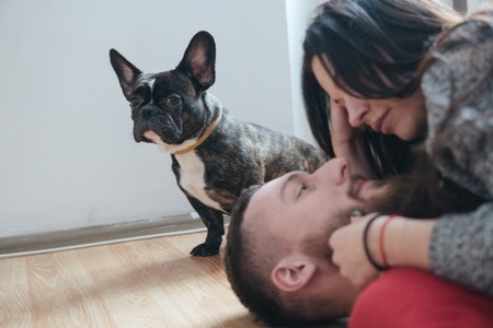 man and woman lying on the floorの写真素材