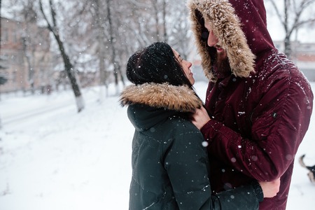 Young couple having fun on the snowの写真素材