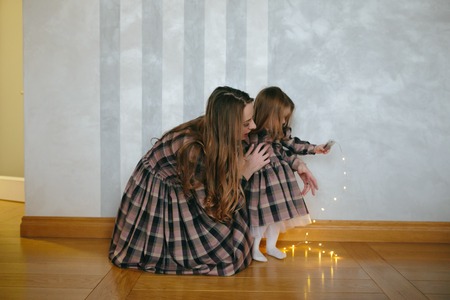 Young mother with adorable baby