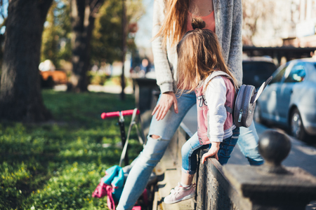 Mom and daughter in the parkの写真素材