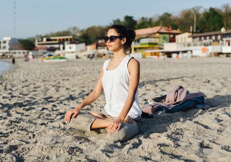 Young woman practicing yogaの写真素材