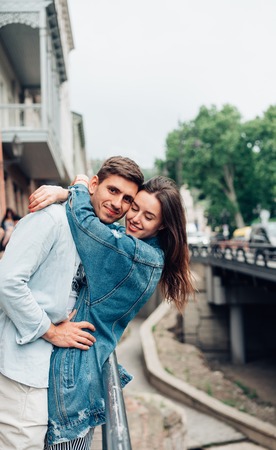 Guy and girl on a city streetの写真素材