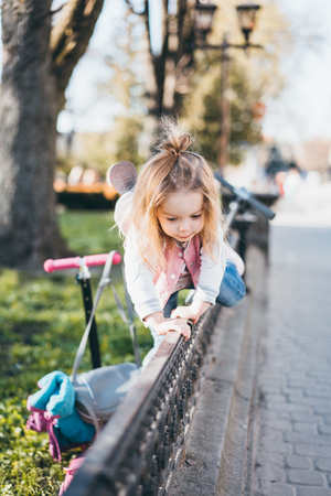 Little girl on the streetの写真素材