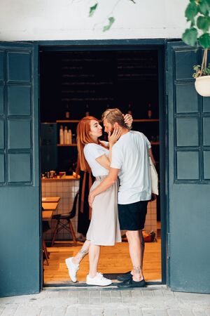 couple posing in the doorwayの写真素材