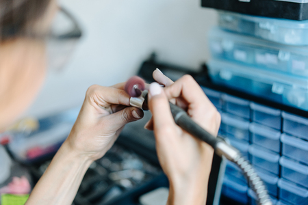 The girl is engaged in jewelry businessの写真素材