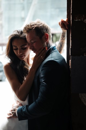 couple posing in the doorwayの写真素材