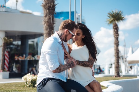 Girl and handsome guy outdoorsの写真素材