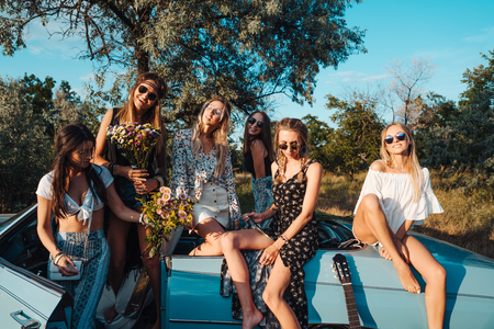 Six girls have fun in the countrysideの写真素材