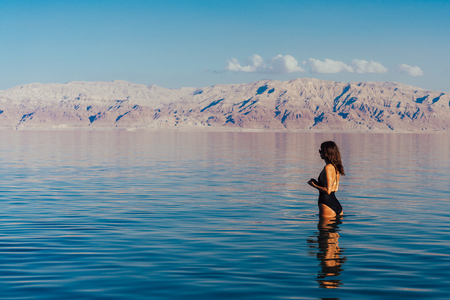 Young woman going to Dead Sea, Israelの写真素材
