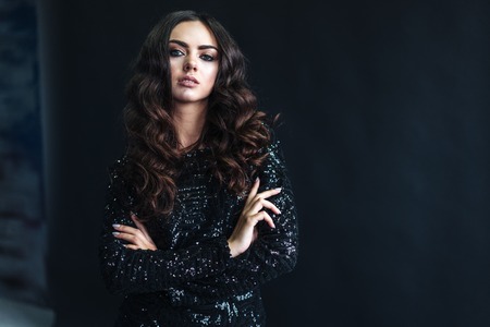 beautiful young woman with long curly hair