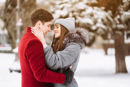 A young guy and a girl are hugging each otherの写真素材