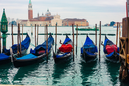 Gondolas moored by Saint Mark squareの写真素材