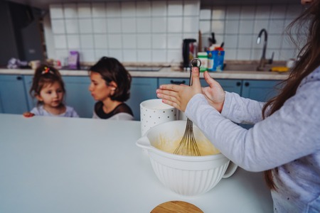 Happy family cook together in the kitchen